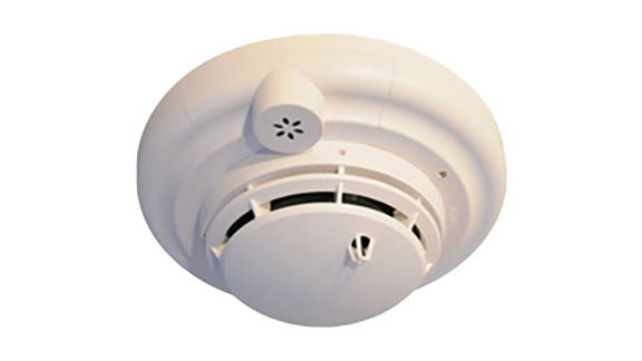 A white smoke detector