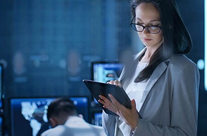 woman using tab in office