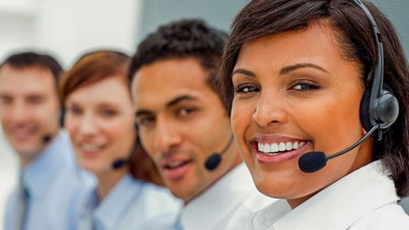 people wearing headphones looking camera
